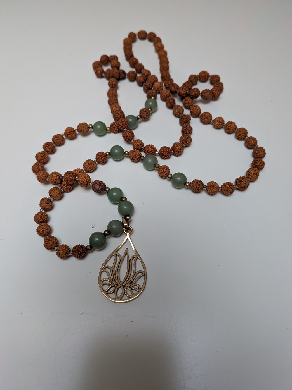 Rudraksha Bead Mala Necklace with Green Stone and Gold Lotus Pendant